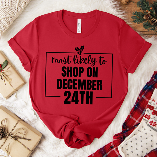 Most Likely to Shop on December 24th Tee — Holiday T‑Shirt